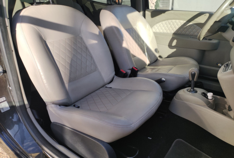 Renault Twingo II Phase 2 / 1.2 i INITIALE  75 cv Boîte auto